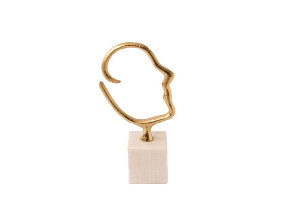 ornament van een silhouet van een hoofd gemaakt van gebogen metaalstaaf van 2,75cm dik met een breedte van 13cm en hoogte is 21cm