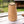 Waxinehouder Naturel Acacia Hout 7x13cm  op een houten tuintafel
