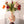 Diverse soorten tulpen in multicolor  met diverse groen gebonden op een gebloemde vaas op een tafel-WinQ