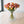 Boeket kunstbloemen tulpen in 5 kleuren totaal 35 stuks in 5 voorjaarskleuren op een vaas op een tafel voor een raam - WinQ