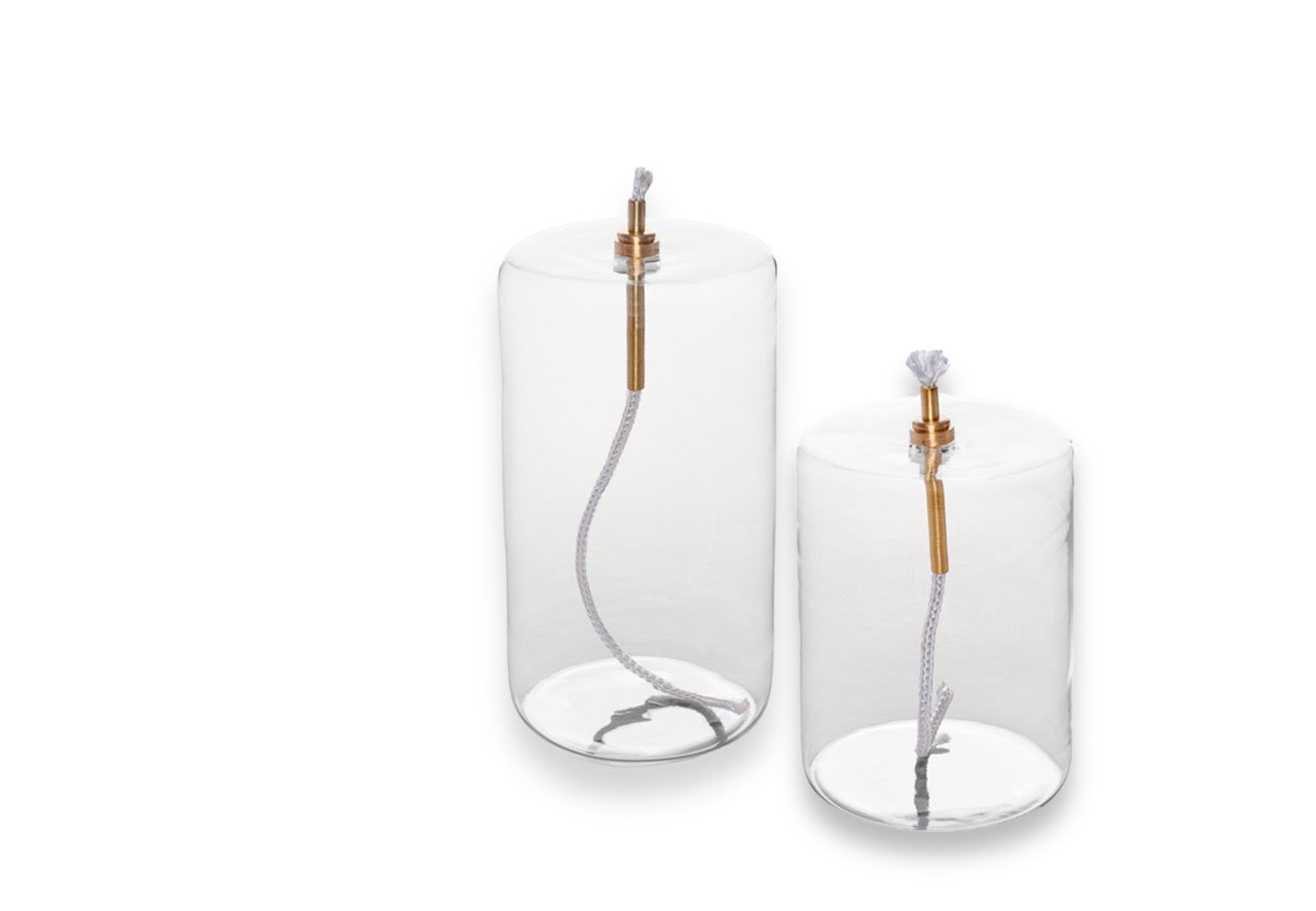 2 olielampen van helder glas in cilinder vorm diameter 7cm en hoogte 10 en 13,5 cm