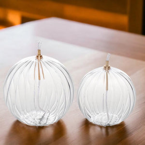 olielamp in bolvorm met diameter 10cm en 12 cm met een verticaal ribbelstructuur