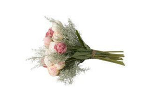 boeket tulpen liggend gefotografeerd met groene asparagus en witte kunsttulpen